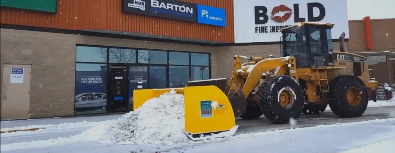 seasonal snow removal contract BC interior property with cleared driveway and salted walkways in Kamloops