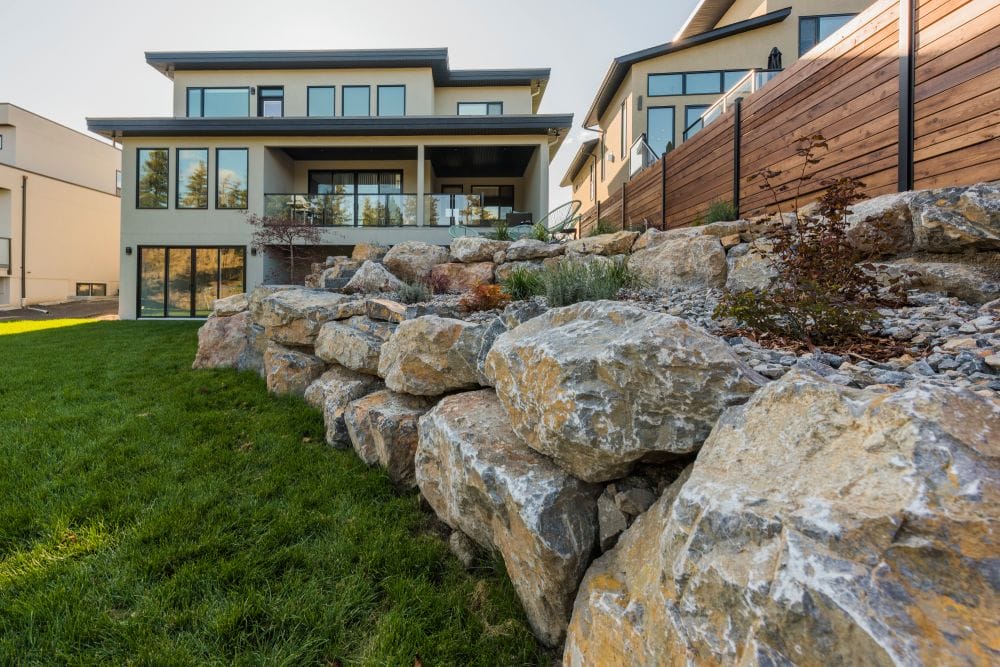 Fall hardscape and drainage inspection at a Vernon BC residential property before winter by Lyons Landscaping